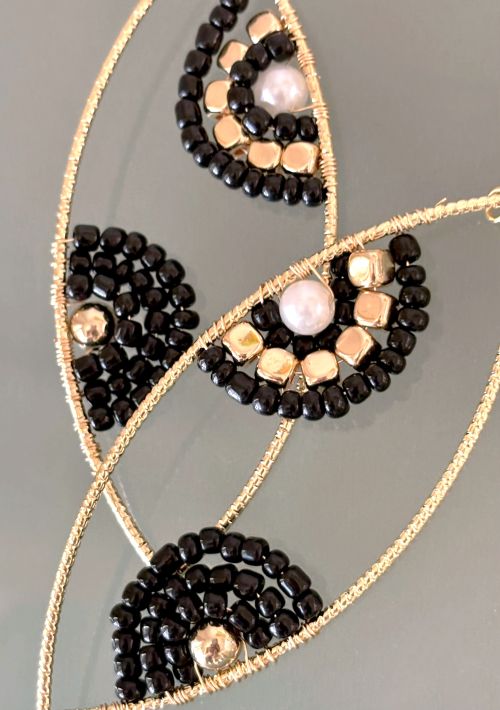 Elegant Black and Gold Beaded Ellipse Earrings